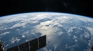 Photorealistic aerial photograph clearly showing the edge of the Earth from space, capturing realistic curvature, atmosphere, and sunlight reflections - Google Nano Banana Pro