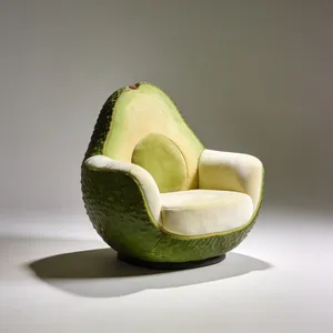 An armchair designed in the shape of an avocado, presented in a contemporary product photography style with professional studio lighting against a minimalist background. - Bytedance Seedream 4.5