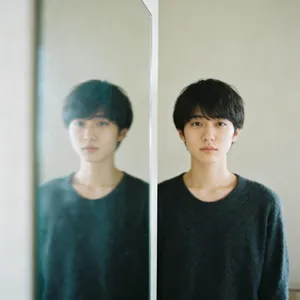 A person standing before a mirror, with their front and reflected back both visible. - Bytedance Seedream 4.0