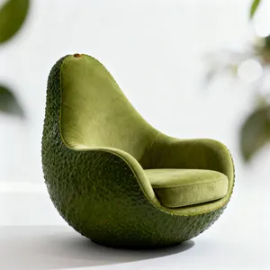 An armchair designed in the shape of an avocado, presented in a contemporary product photography style with professional studio lighting against a minimalist background. - Bytedance Seedream 4.0