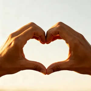 Two hands forming a heart shape together against a plain background. - Bytedance Seedream 4.0