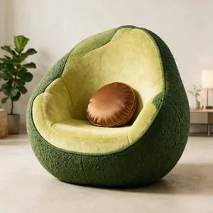 An armchair designed in the shape of an avocado, presented in a contemporary product photography style with professional studio lighting against a minimalist background. - Bytedance Seedream 5.0 Pro