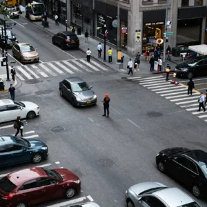 A busy city intersection with cars, pedestrians, and street performers all in one frame. - Alibaba Z-Image Turbo
