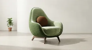 An armchair designed in the shape of an avocado, presented in a contemporary product photography style with professional studio lighting against a minimalist background. - Google Nano Banana 2 Lite