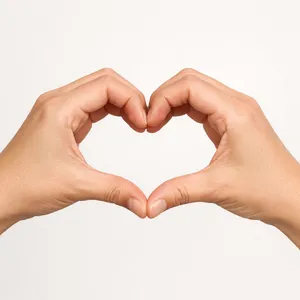Two hands forming a heart shape together against a plain background. - OpenAI GPT Image 1.5