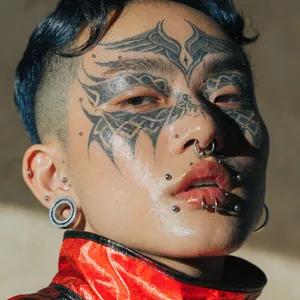 A portrait of a person with elaborate facial tattoos and piercings, shown in sharp detail. - Recraft Recraft V4.1