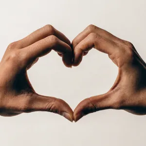 Two hands forming a heart shape together against a plain background. - Recraft Recraft V4.1