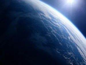 Photorealistic aerial photograph clearly showing the edge of the Earth from space, capturing realistic curvature, atmosphere, and sunlight reflections - XAI Grok 2 Image